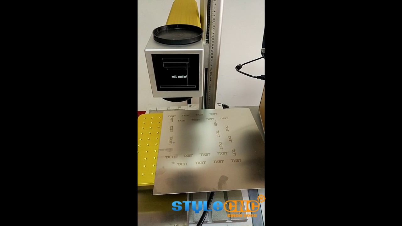 30W 帶移動工作臺的鍵盤光纖激光雕刻機(jī)